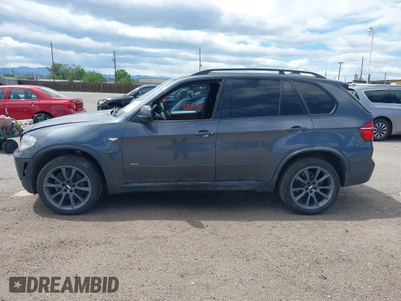 2012 BMW X5 35i z VIN 5UXZV4C53CL987556, wystawiony jako IAAI lot #42297756 z przebiegiem 190 922 mil mil oraz . Historia ofert i sprzedaży dostępna na DreamBid. Obrazek 14.