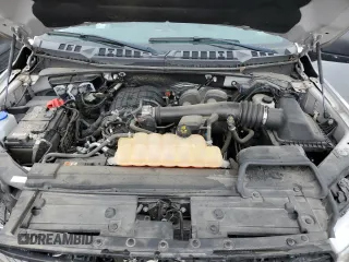 2018 Ford F-150 XL with VIN 1FTEW1EB7JKD92713, listed as a Copart auction lot 65621244 with 32,671 mi miles and Salvage Title. Bid and sale history available at carsss.com. Image 12.