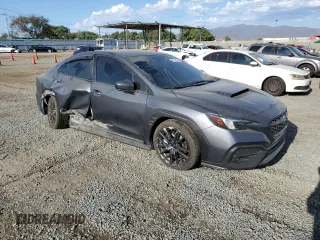 2023 Subaru WRX Premium с VIN JF1VBAH60P8805562, выставлен на аукционе Copart как лот 68148074 с пробегом 26 458 миль миль и Списание • Salvage title. История ставок и продаж доступна на DreamBid. Изображение 4.