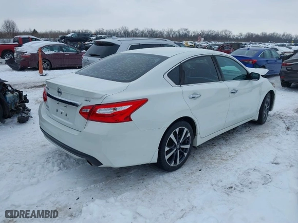 2016 Nissan Altima 2.5 SR with VIN 1N4AL3AP1GN383538, listed as a IAAI auction lot 41264765 with 129,836 mi miles. Bid and sale history available at carsss.com. Image 4.