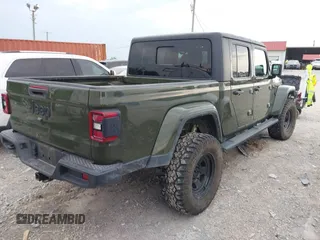 2022 Jeep Gladiator Texas Trail z VIN 1C6HJTAG1NL105124, wystawiony jako IAAI lot #42601707 z przebiegiem 52 064 mil mil oraz . Historia ofert i sprzedaży dostępna na DreamBid. Obrazek 4.