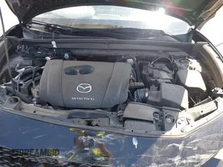 2021 Mazda CX-30 S with VIN 3MVDMBAL0MM254030, listed as a IAAI auction lot 42261180 with 72,459 mi miles and . Bid and sale history available at DreamBid. Image 10.