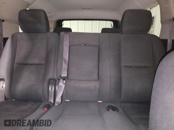 2013 Chevrolet Suburban LS with VIN 1GNSKHE72DR263672, listed as a Copart auction lot 87855905 with 124,081 mi miles and Salvage Title. Bid and sale history available at carsss.com. Image 10.