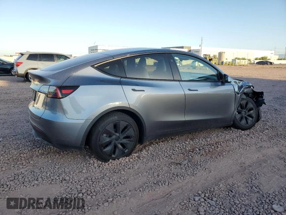 2024 Tesla Model Y Long Range z VIN 7SAYGAEEXRF211507, wystawiony jako Copart lot #56432715 z przebiegiem Nie podano mil oraz Szkoda całkowita • Salvage title. Historia ofert i sprzedaży dostępna na DreamBid. Obrazek 3.