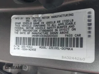 2004 Toyota Corolla CE with VIN 1NXBR32E84Z203320, listed as a IAAI auction lot 41851388 with 175,084 mi miles. Bid and sale history available at carsss.com. Image 9.