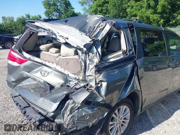 2011 Toyota Sienna XLE AAS with VIN 5TDYK3DC4BS136568, listed as a IAAI auction lot 42639252 with 239,020 mi miles and . Bid and sale history available at DreamBid. Image 6.