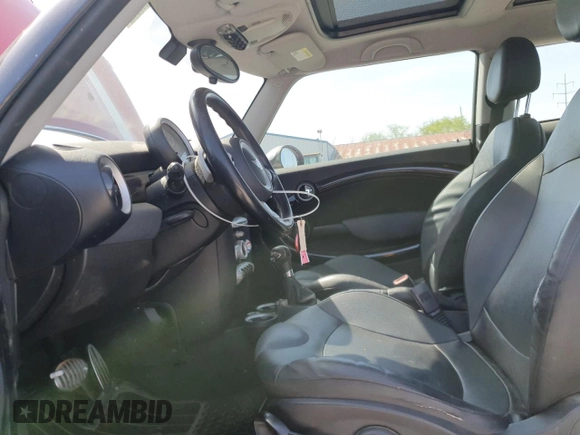 2009 MINI Hardtop S with VIN WMWMF73599TW87973, listed as a Copart auction lot 53343985 with 73,742 mi miles and Salvage Title. Bid and sale history available at DreamBid. Image 7.