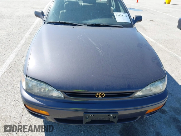 1996 Toyota Camry DX with VIN 4T1BG12K8TU915891, listed as a IAAI auction lot 41874731 with 57,564 mi miles. Bid and sale history available at carsss.com. Image 12.
