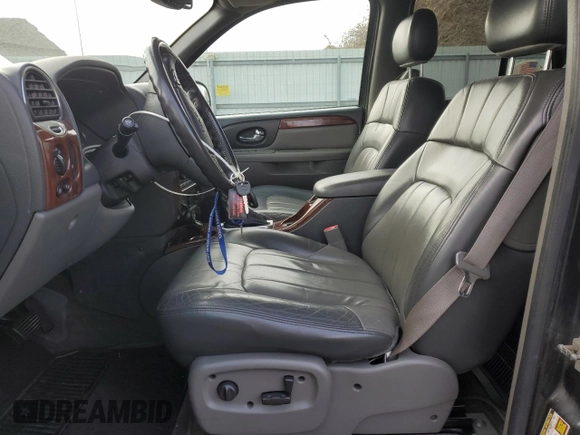 2004 GMC Envoy SLT z VIN 1GKDT13S042406662, wystawiony jako Copart lot #50523855 z przebiegiem 62 122 mil mil oraz Czysty tytuł • Clean title. Historia ofert i sprzedaży dostępna na DreamBid. Obrazek 7.
