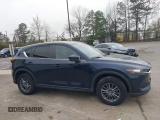 2017 Mazda CX-5 Touring with VIN JM3KFBCL9H0163449, listed as a IAAI auction lot 41919020 with 102,898 mi miles. Bid and sale history available at carsss.com. Image 13.