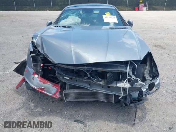 2014 Mercedes-Benz SLK 250 with VIN WDDPK4HA7EF092618, listed as a IAAI auction lot 42150470 with 52,727 mi miles and . Bid and sale history available at DreamBid. Image 6.