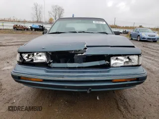 1996 Oldsmobile Cutlass Ciera 1SA VX5 z VIN 1G3AJ55M2T6382818, wystawiony jako Copart lot #80290114 z przebiegiem 137 463 mil mil oraz Szkody całkowita. Historia ofert i sprzedaży dostępna na DreamBid. Obrazek 5.