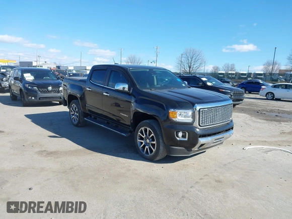 2019 GMC Canyon 4WD Denali with VIN 1GTG6EEN5K1135003, listed as a IAAI auction lot 41599314 with 108,087 mi miles. Bid and sale history available at carsss.com. Image 1.