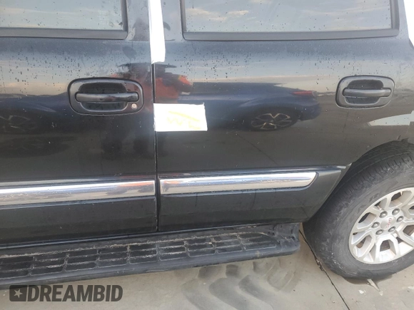 2004 GMC Yukon SLT with VIN 1GKEC13T74R119419, listed as a Copart auction lot 74014864 with 0 mi miles and Salvage Title. Bid and sale history available at carsss.com. Image 12.