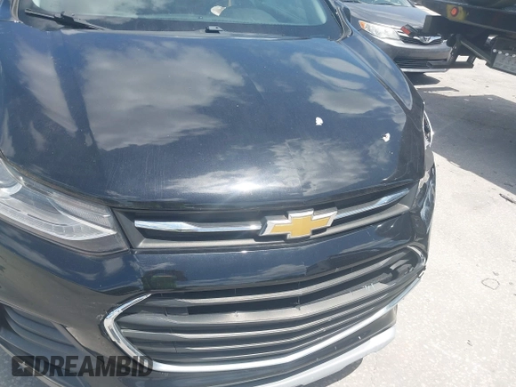 2018 Chevrolet Trax LT with VIN 3GNCJLSB9JL276974, listed as a IAAI auction lot 41959303 with 59,686 mi miles and . Bid and sale history available at carsss.com. Image 17.