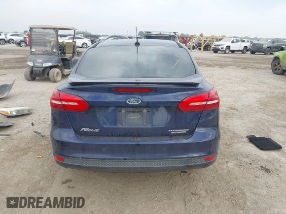 2016 Ford Focus Titanium with VIN 1FADP3J21GL404602, listed as a IAAI auction lot 42270177 with 118,369 mi miles and . Bid and sale history available at DreamBid. Image 17.