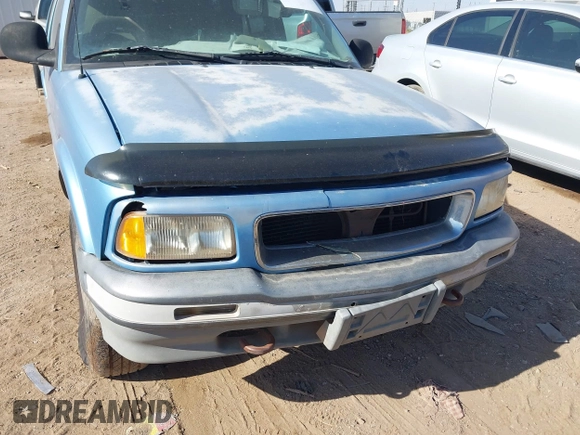 1997 GMC Jimmy SLS z VIN 1GKDT13W1V2514504, wystawiony jako IAAI lot #42211457 z przebiegiem 199 589 mil mil oraz . Historia ofert i sprzedaży dostępna na DreamBid. Obrazek 11.