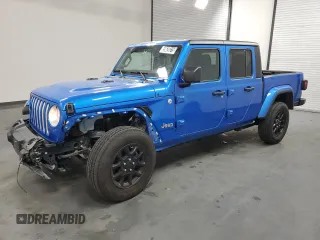2023 Jeep Gladiator Overland z VIN 1C6HJTFG6PL564337, wystawiony jako Copart lot #59620315 z przebiegiem 31 552 mil mil oraz Czysty tytuł • Clean title. Historia ofert i sprzedaży dostępna na DreamBid. Obrazek 1.