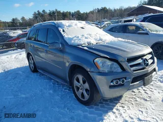2011 Mercedes-Benz GL-Class GL 450 with VIN 4JGBF7BE3BA700323, listed as a IAAI auction lot 41586109 with 165,457 mi miles. Bid and sale history available at carsss.com. Image 1.