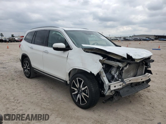 2021 Honda Pilot Touring 8-Passenger with VIN 5FNYF5H90MB001805, listed as a Copart auction lot 79101514 with 41,607 mi miles and Salvage Title. Bid and sale history available at DreamBid. Image 4.
