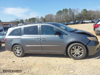 2012 Honda Odyssey EX-L with VIN 5FNRL5H64CB066240, listed as a IAAI auction lot 41792321 with 186,895 mi miles. Bid and sale history available at carsss.com. Image 12.