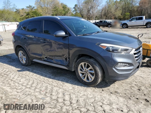 2017 Hyundai Tucson SE with VIN KM8J33A49HU485334, listed as a Copart auction lot 51931025 with 103,907 mi miles and Salvage Title. Bid and sale history available at DreamBid. Image 4.