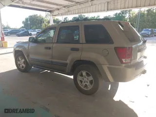 2005 Jeep Grand Cherokee Laredo with VIN 1J8HR48N95C713185, listed as a IAAI auction lot 41777242 with 95,262 mi miles. Bid and sale history available at carsss.com. Image 3.