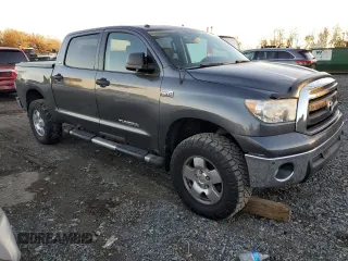 2011 Toyota Tundra 4WD Truck with VIN 5TFDY5F12BX205210, listed as a Copart auction lot 79915794 with 214,543 mi miles and Salvage Title. Bid and sale history available at carsss.com. Image 4.