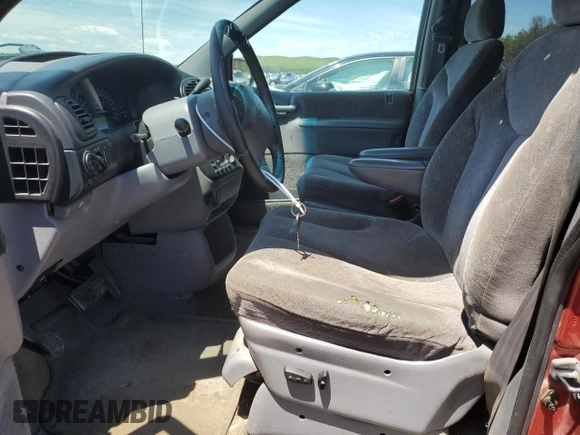 2000 Dodge Caravan SE with VIN 1B4GP44R7YB779226, listed as a Copart auction lot 56919784 with 202,679 mi miles and Salvage Title. Bid and sale history available at DreamBid. Image 7.