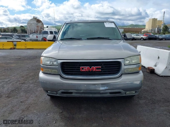 2004 GMC Yukon SLT with VIN 1GKEC13V74J311617, listed as a IAAI auction lot 41785561 with 225,245 mi miles. Bid and sale history available at carsss.com. Image 6.