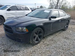 2013 Dodge Charger RT with VIN 2C3CDXCTXDH541059, listed as a IAAI auction lot 42135390 with 154,250 mi miles. Bid and sale history available at carsss.com. Image 2.