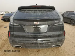 2024 Cadillac XT4 FWD Sport with VIN 1GYFZER46RF100076, listed as a Copart auction lot 45741285 with 11,616 mi miles and Salvage title. Bid and sale history available at DreamBid. Image 6.