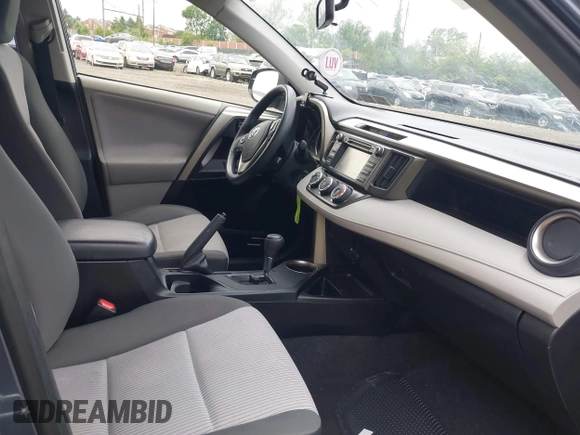 2013 Toyota RAV4 LE with VIN JTMZFREV1D5010172, listed as a IAAI auction lot 42205217 with 118,924 mi miles and . Bid and sale history available at DreamBid. Image 5.