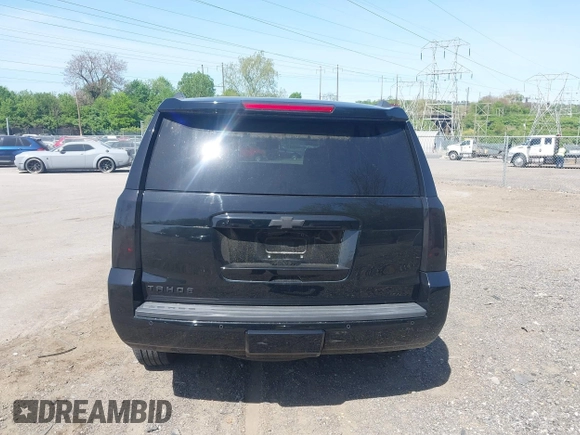 2020 Chevrolet Tahoe LT with VIN 1GNSKBKCXLR255963, listed as a IAAI auction lot 42127845 with 46,746 mi miles and . Bid and sale history available at DreamBid. Image 16.
