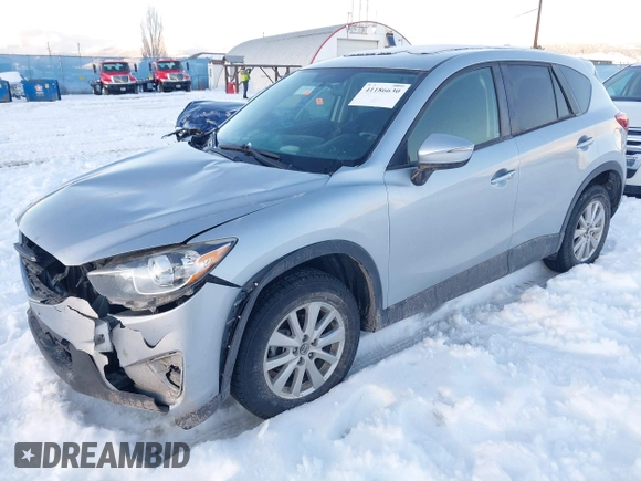 2016 Mazda CX-5 Touring with VIN JM3KE4CY9G0904000, listed as a IAAI auction lot 41186630 with 73,900 mi miles. Bid and sale history available at carsss.com. Image 17.