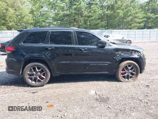2019 Jeep Grand Cherokee Limited z VIN 1C4RJFBG6KC696561, wystawiony jako IAAI lot #42497444 z przebiegiem 50 769 mil mil oraz . Historia ofert i sprzedaży dostępna na DreamBid. Obrazek 13.