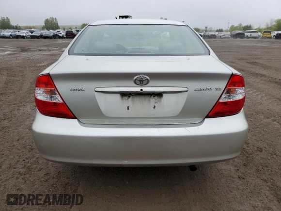 2004 Toyota Camry LE with VIN 4T1BE30K64U323377, listed as a Copart auction lot 58249465 with 274,902 mi miles and Salvage title. Bid and sale history available at DreamBid. Image 6.