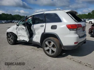 2014 Jeep Grand Cherokee Limited with VIN 1C4RJFBGXEC325357, listed as a Copart auction lot 61993715 with 156,718 mi miles and Salvage title. Bid and sale history available at DreamBid. Image 2.