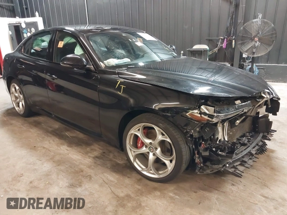 2021 Alfa Romeo Giulia Ti z VIN ZARFANBN7M7644482, wystawiony jako IAAI lot #42502199 z przebiegiem 27 962 mil mil oraz . Historia ofert i sprzedaży dostępna na DreamBid. Obrazek 1.