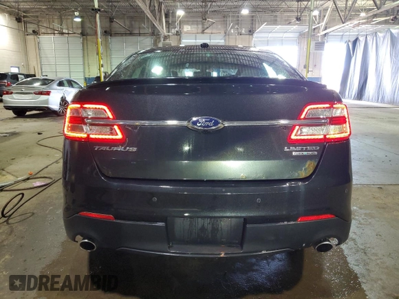 2013 Ford Taurus Limited z VIN 1FAHP2F8XDG142592, wystawiony jako Copart lot #52751465 z przebiegiem 152 883 mil mil oraz Czysty tytuł • Clean title. Historia ofert i sprzedaży dostępna na DreamBid. Obrazek 6.