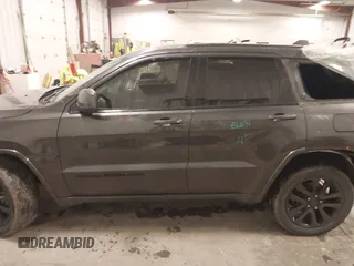 2018 Jeep Grand Cherokee Laredo E with VIN 1C4RJFAG6JC499261, listed as a IAAI auction lot 41033418 with 67,554 mi miles and . Bid and sale history available at DreamBid. Image 14.