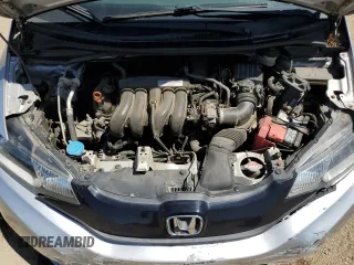 2015 Honda Fit LX с VIN 3HGGK5H5XFM723903, выставлен на аукционе Copart как лот 57249685 с пробегом 90 949 миль миль и Списание • Salvage title. История ставок и продаж доступна на DreamBid. Изображение 11.