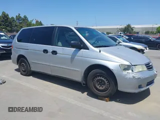 2004 Honda Odyssey LX with VIN 5FNRL18554B021938, listed as a IAAI auction lot 42298603 with 210,105 mi miles and . Bid and sale history available at DreamBid. Image 1.
