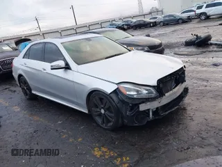 2014 Mercedes-Benz E-Class E 350 Sport with VIN WDDHF5KB4EA876770, listed as a IAAI auction lot 41531940 with 121,993 mi miles. Bid and sale history available at carsss.com. Image 1.