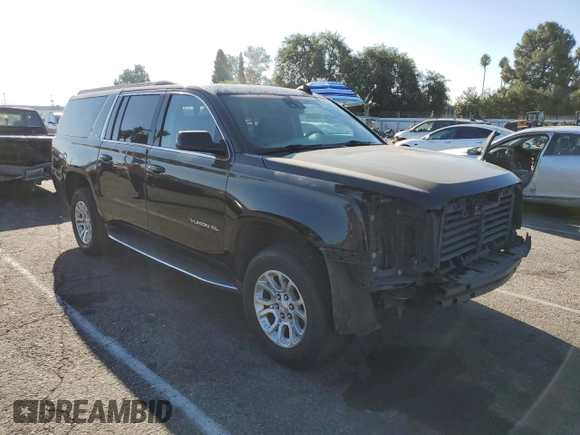 2018 GMC Yukon XL SLT with VIN 1GKS1GKC6JR305624, listed as a Copart auction lot 71157044 with 283,155 mi miles and Salvage Title. Bid and sale history available at carsss.com. Image 4.