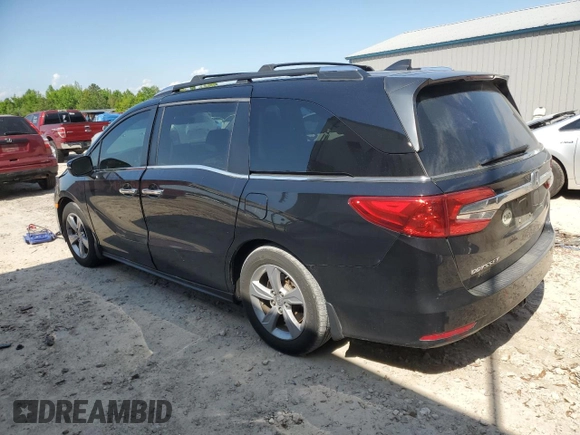 2019 Honda Odyssey EX-L with VIN 5FNRL6H73KB103467, listed as a Copart auction lot 52604005 with 101,892 mi miles and Salvage Title. Bid and sale history available at DreamBid. Image 2.