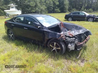 2015 Kia Optima LX with VIN 5XXGM4A72FG513909, listed as a IAAI auction lot 41686610 with 139,524 mi miles. Bid and sale history available at carsss.com. Image 1.