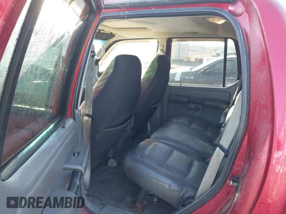 2004 Ford Explorer Sport Trac XLS z VIN 1FMZU67K64UC21974, wystawiony jako IAAI lot #42017439 z przebiegiem 193 613 mil mil oraz . Historia ofert i sprzedaży dostępna na DreamBid. Obrazek 8.