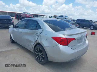 2017 Toyota Corolla L z VIN 5YFBURHE4HP732912, wystawiony jako IAAI lot #42451597 z przebiegiem 73 901 mil mil oraz . Historia ofert i sprzedaży dostępna na DreamBid. Obrazek 3.