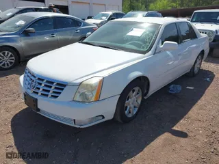 2007 Cadillac DTS Luxury I with VIN 1G6KD57Y17U126850, listed as a IAAI auction lot 41907481 with 123,977 mi miles. Bid and sale history available at carsss.com. Image 2.